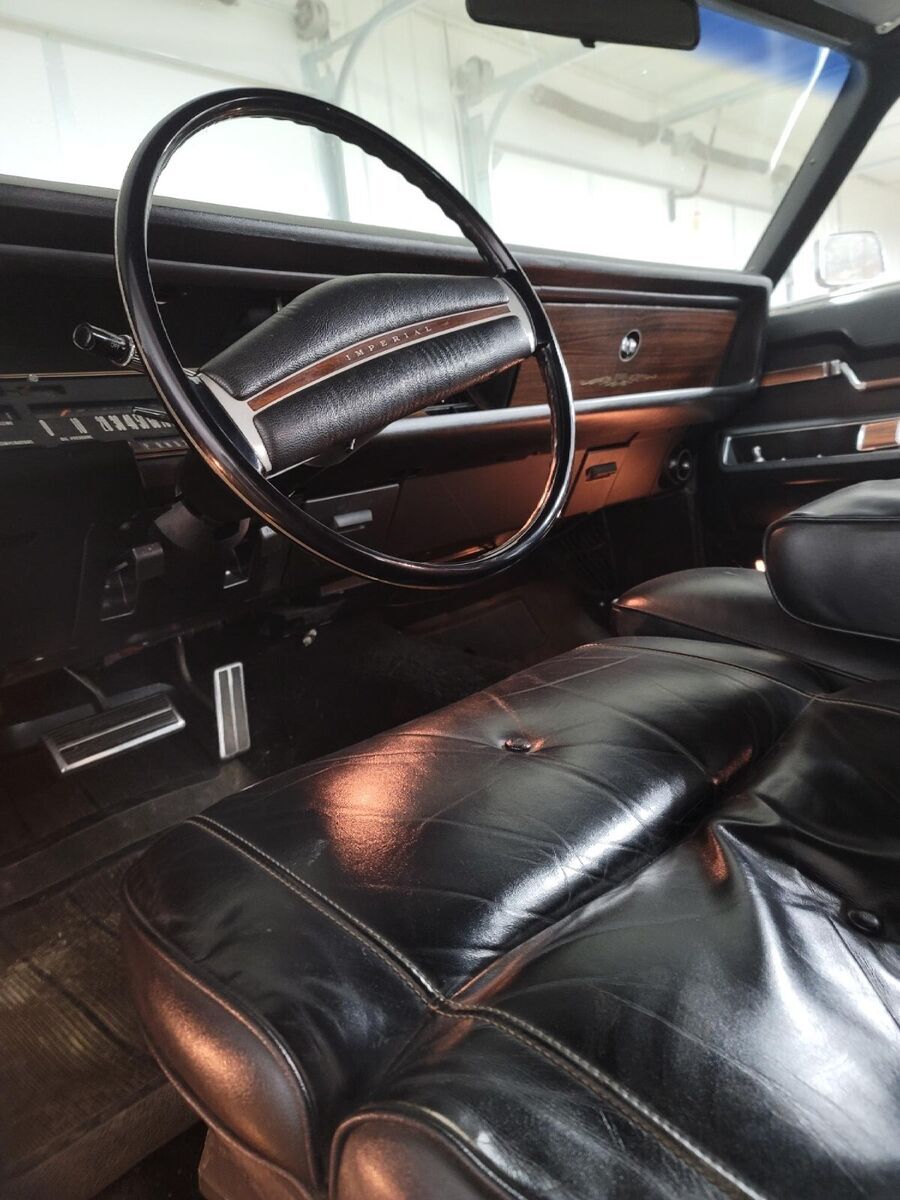 red lebaron wirh black vinyl top and black interior