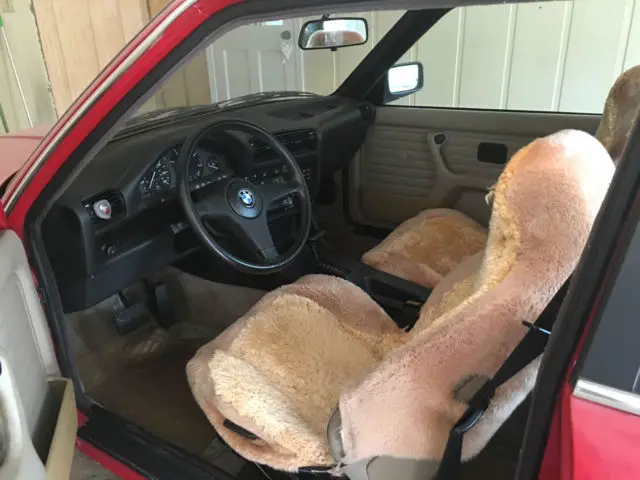 1985 red bmw 325e two door with gold bbs wheels