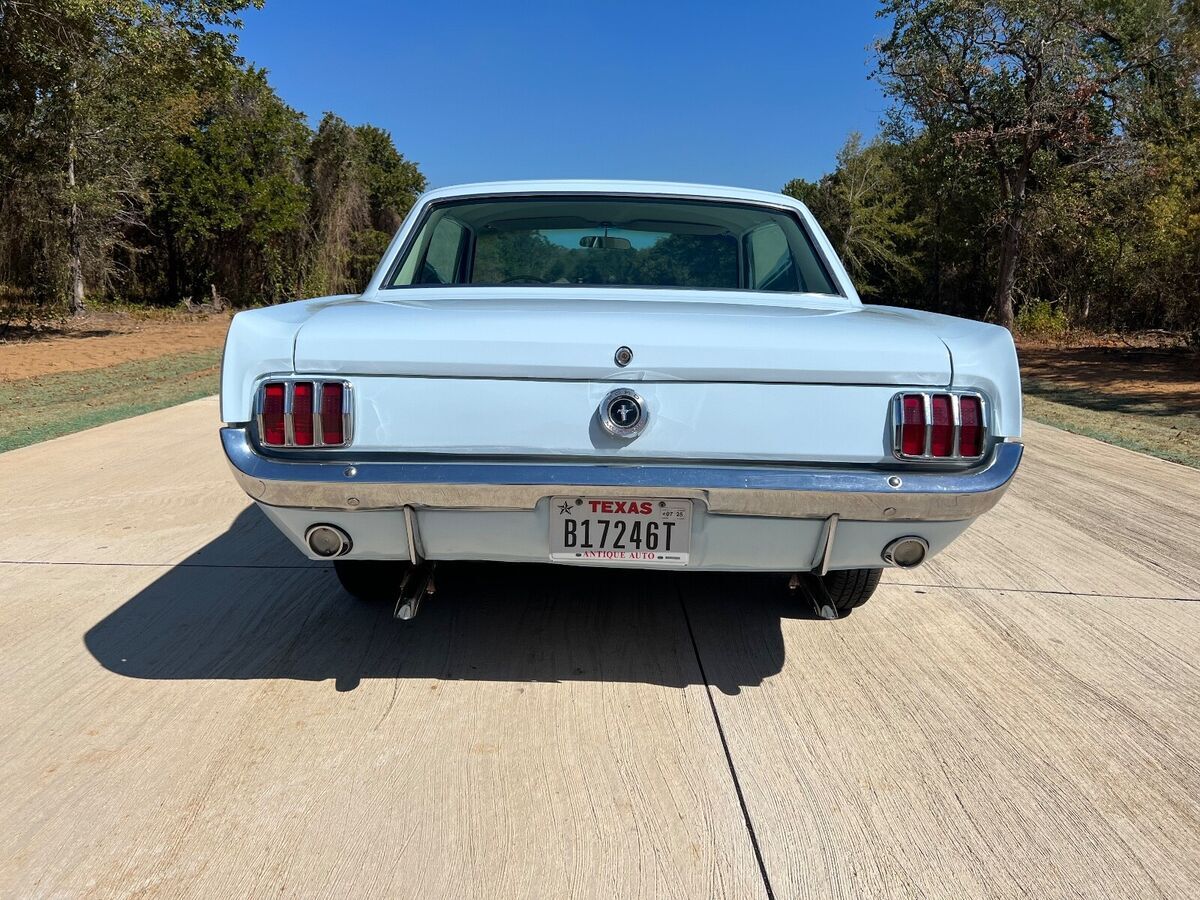early 1965 mustang a-code 289 v8, factory air, 4-barrel carb very clean