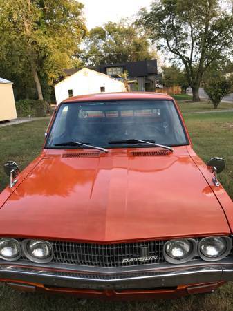beautiful datsun original orange color no rust- lowered price