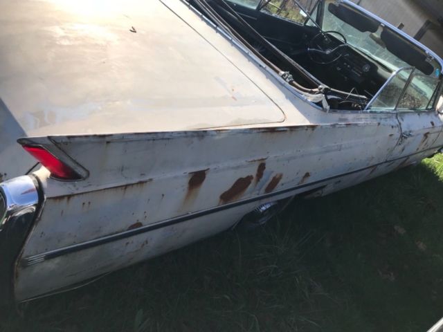 1964 cadillac convertible. needs full restoration factory ac , low reserve