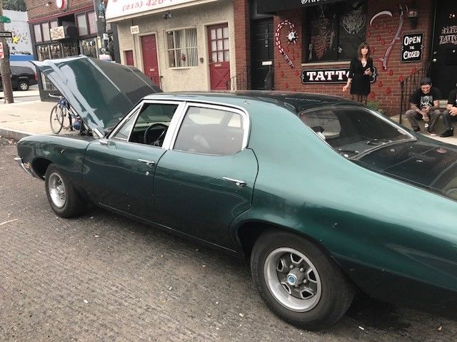 1972 emerald green buick skylark (4 door)