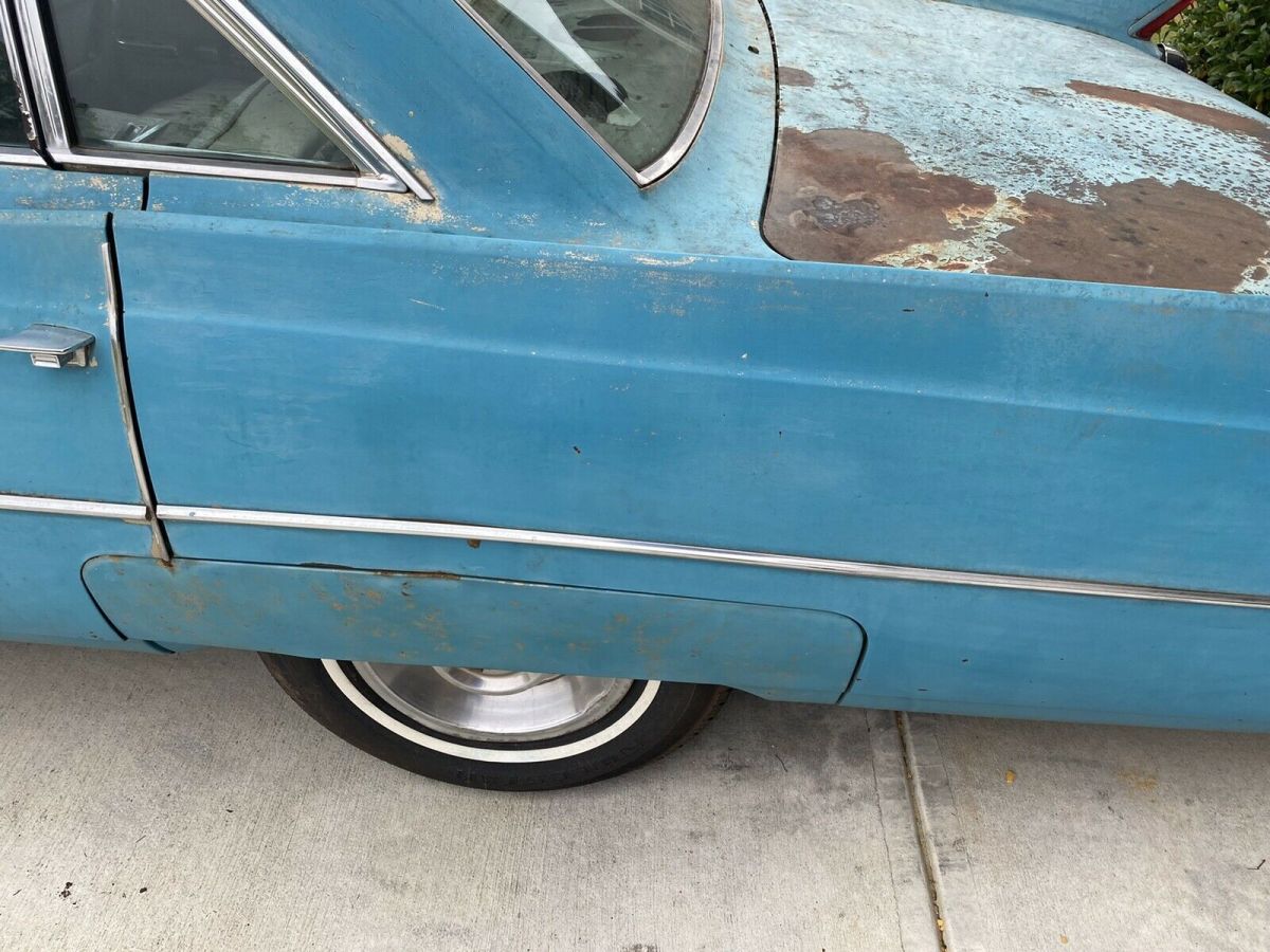 1964 cadillac series 62 sedan blue rwd automatic six window