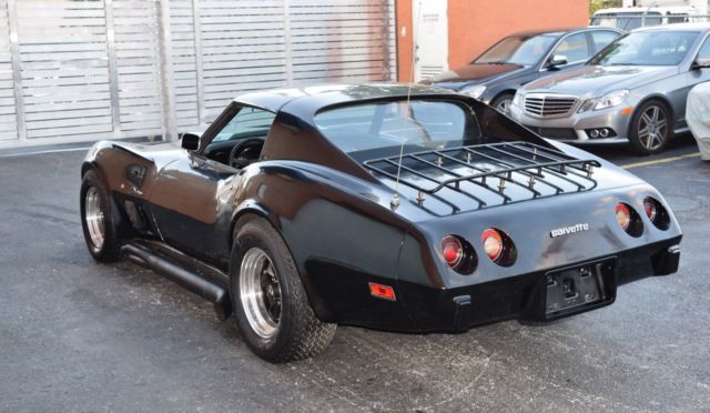 corvewtte / c3 / big block 454 4 speed/ t-top / stingray black on black