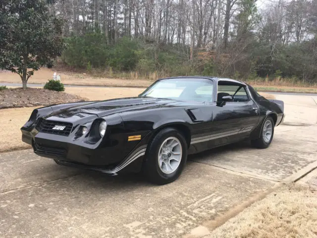 1981 chevrolet camaro z28 5.7l 6-speed manual black on black t-tops autometer