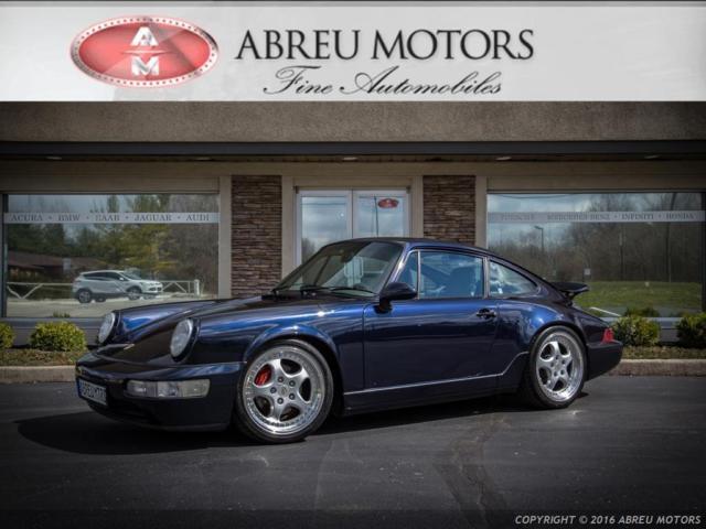 stunning midnight blue metallic over dark gray leather w/ black piping interior