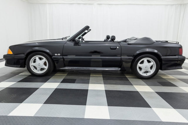 2dr convertible gt one owner!! ultra low miles!! triple black!!! rare!! all pape