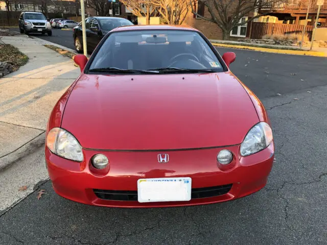 drives well, low mileage under 82k. manual 5-speed. targa top convertible