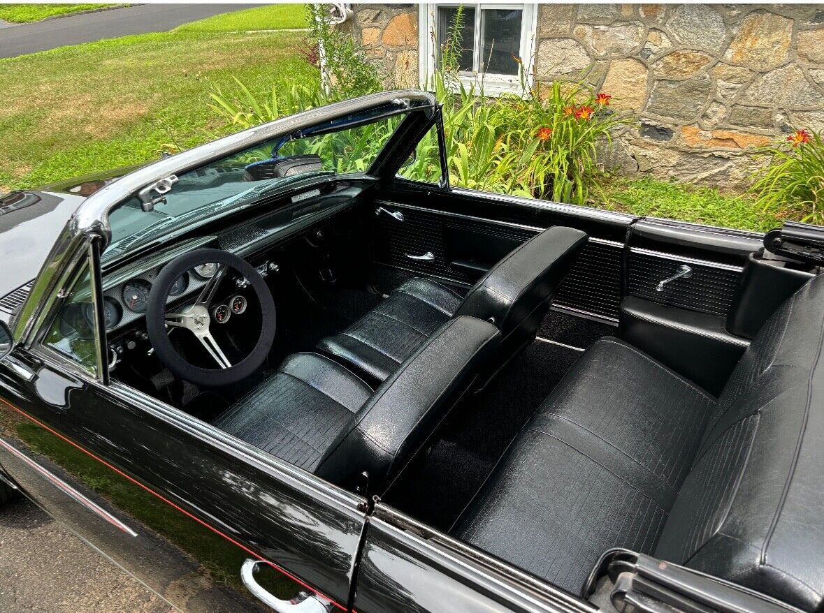 1963 pontiac tempest convertible 2-door 3 speed. engine is 326 not 327