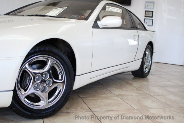 10,000miles*white/tan*2+2*stock*original*leather*carfaxcertified*serviced*rare!