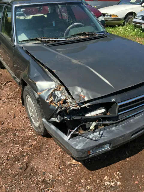 1984 honda accord 1.8 auto grey 4 door body damage will run onto a trailer title