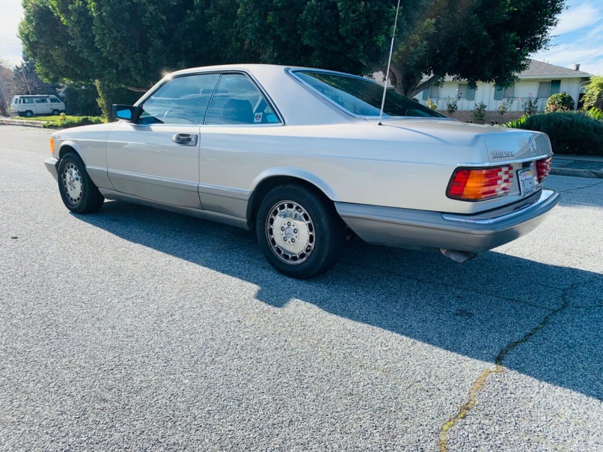 1987 mercedes 560 sec - champagne metallic with brown leather interior