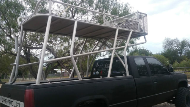 1988 chevy pickup with a 6" lift and aluminum shark rack