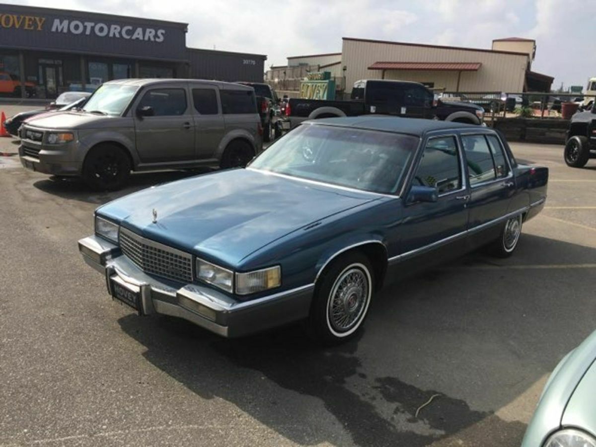 cadillac just a good running caddy , needs a head liner and a/c serviced