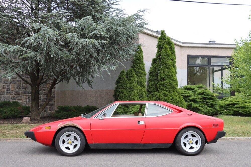 1975 ferrari 308gt4 gasoline red with a tan leather interior
