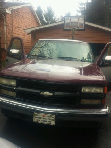 1994 two tone red/silver chevrolet pickup 1500 extended cab