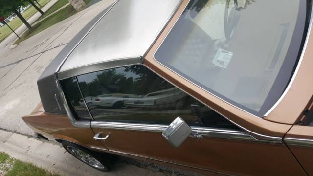 brown, great engine, 2 door, 134a a/c , leather interior
