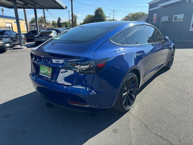 2018 tesla model 3 mid range