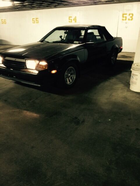 1985 totota celica gts, black, convertible, 5 speed, black leather, black top