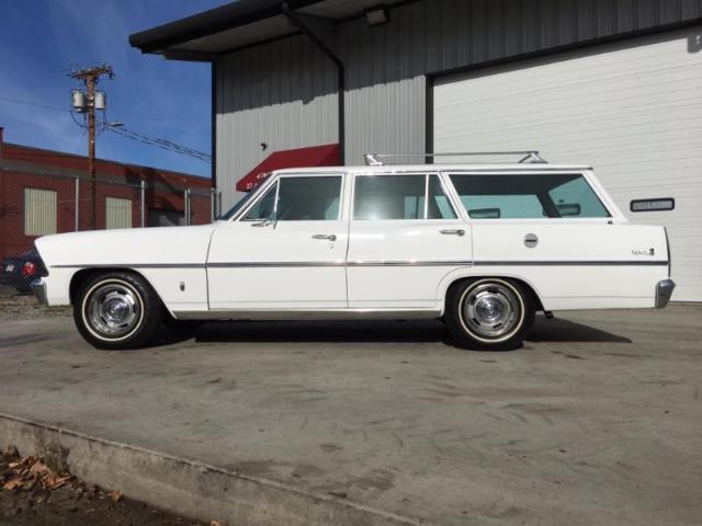 clean wagon, white exterior, tan interior, ac works!