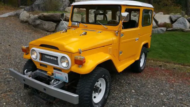 snow plow on a beautiful 1975 fj40 toyota land cruiser - it's ready for winter!
