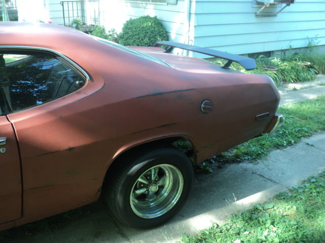 1974 plymouth duster,modified v/8,318 w/360 heads,comp cam