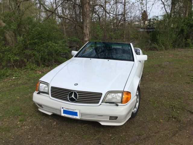 beautiful sl: white and gray, with rich blue inside; runs, drives, looks great!