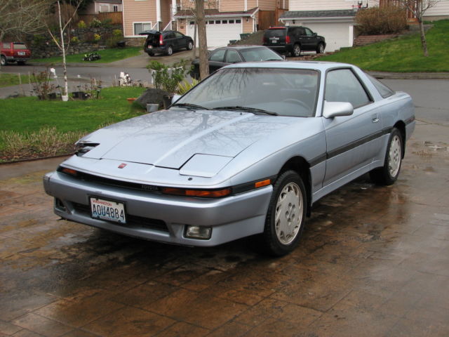 '86 blue toyota supra, 3.0 liter (not turbo), 6 cylinder engine, automatic