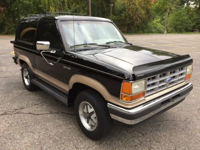 beautiful eddie bauer bronco ll black/gold