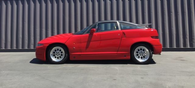 3.0l v6 - rosso w/ tan interior - 5-speed manual trans - speedline wheels