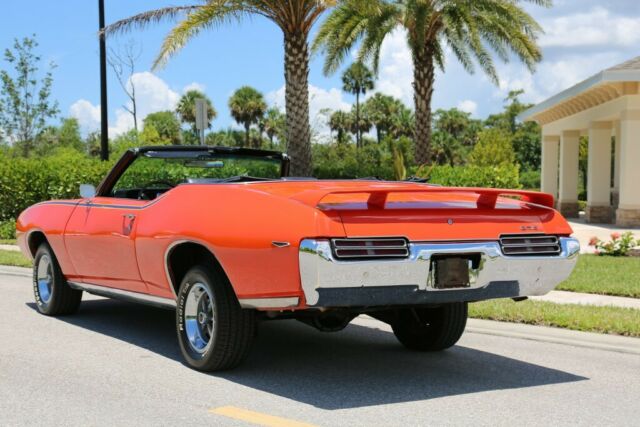 â€œreal 242â€ 1969 gto convertible in carousel red with judge graphics