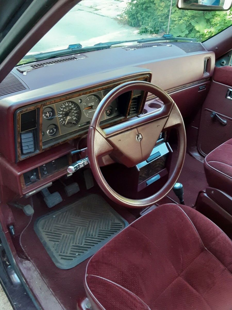 1988 dodge caravan se burgundy (manual transmission)
