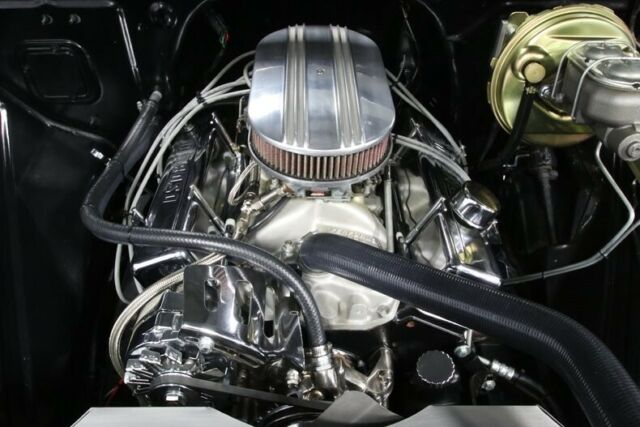classic vintage chrome restored stroker sbc chevy gray black carpet wooden bed