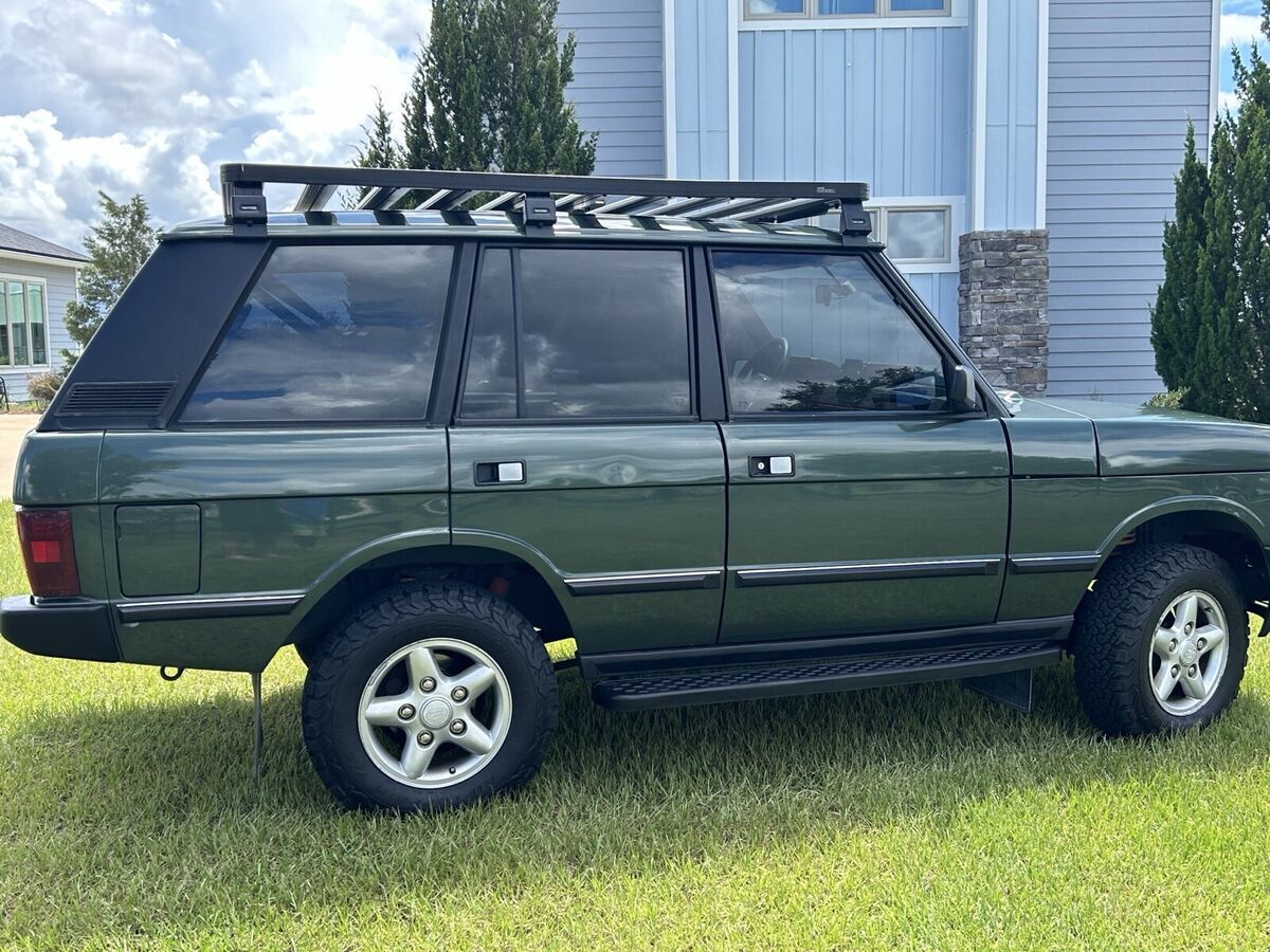 1990 land rover range rover suv green
