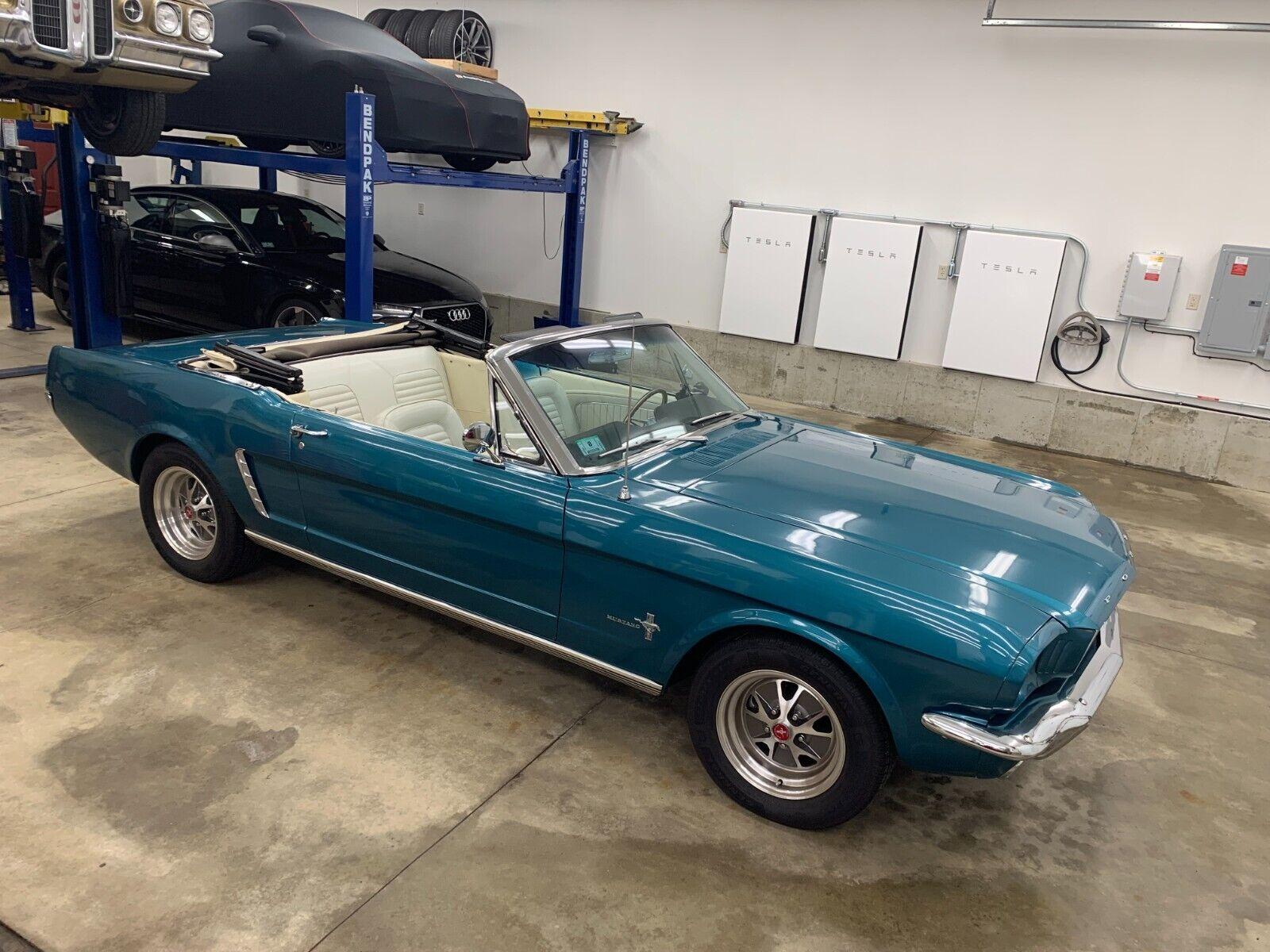 1965 ford mustang convertible in dynasty green with white manual top