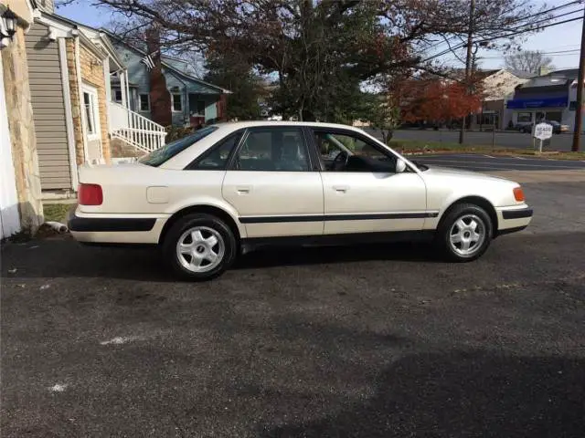 audi 100 cs quattro 5 speed, 136k miles. pearl white over platinum leather