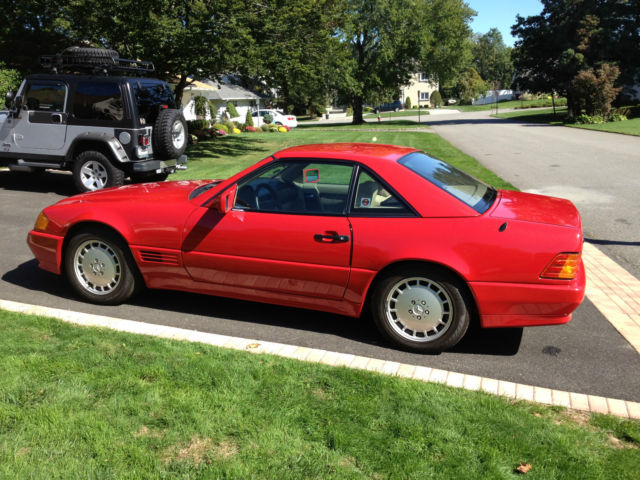 color red coupe pristine condition . creme leather interior