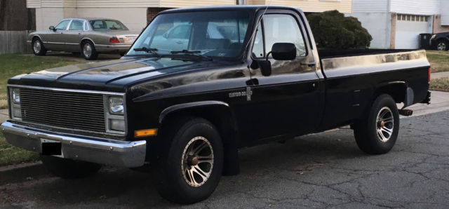 1986 black chevy c-10 custom deluxe pick-up truck