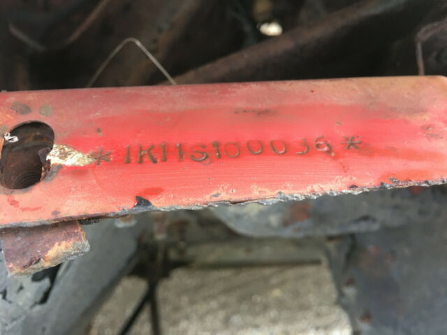 36th 1961 falcon made red 2 door vin #100036 parked since 1976