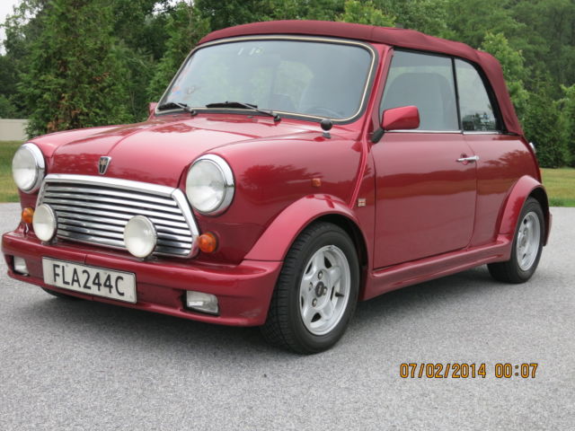 stunning austin classic mini convertable in knightfire red
