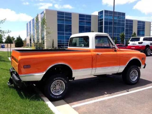 1968 gmc shortbed 4x4 350 engine, 5 speed, new tires, new paint, orange 4wd