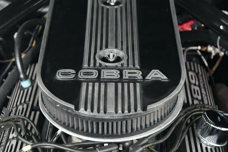 2,300 miles since restored like a shelby. new a/c!