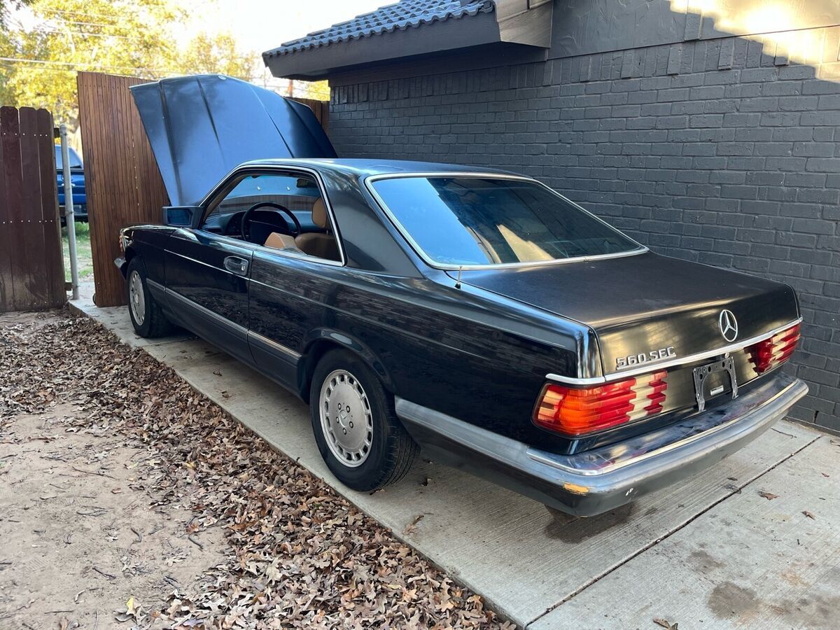 1990 mercedes-benz 500-series black rwd automatic sec