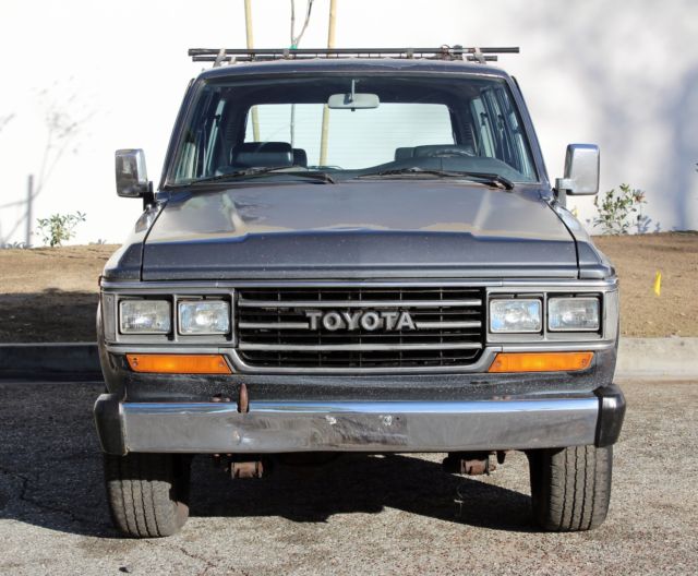 1990 toyota land cruiser, fj62 4x4, high miles, runs well, has some rust
