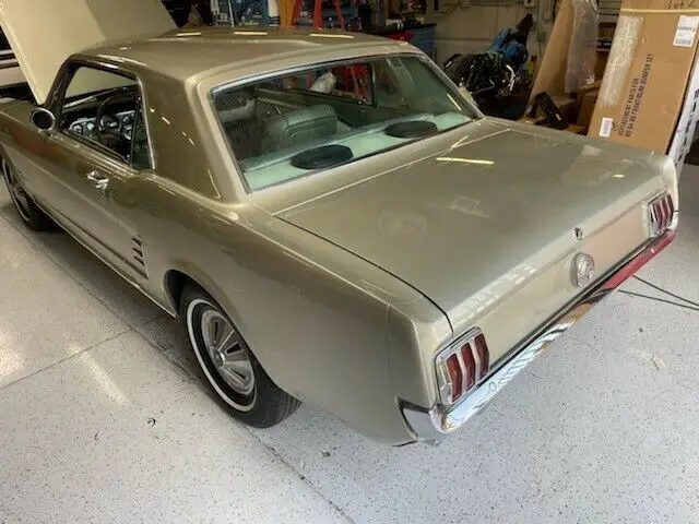 this beautiful restored mustang 6 cyl. coupe has a pony interior, console and ac