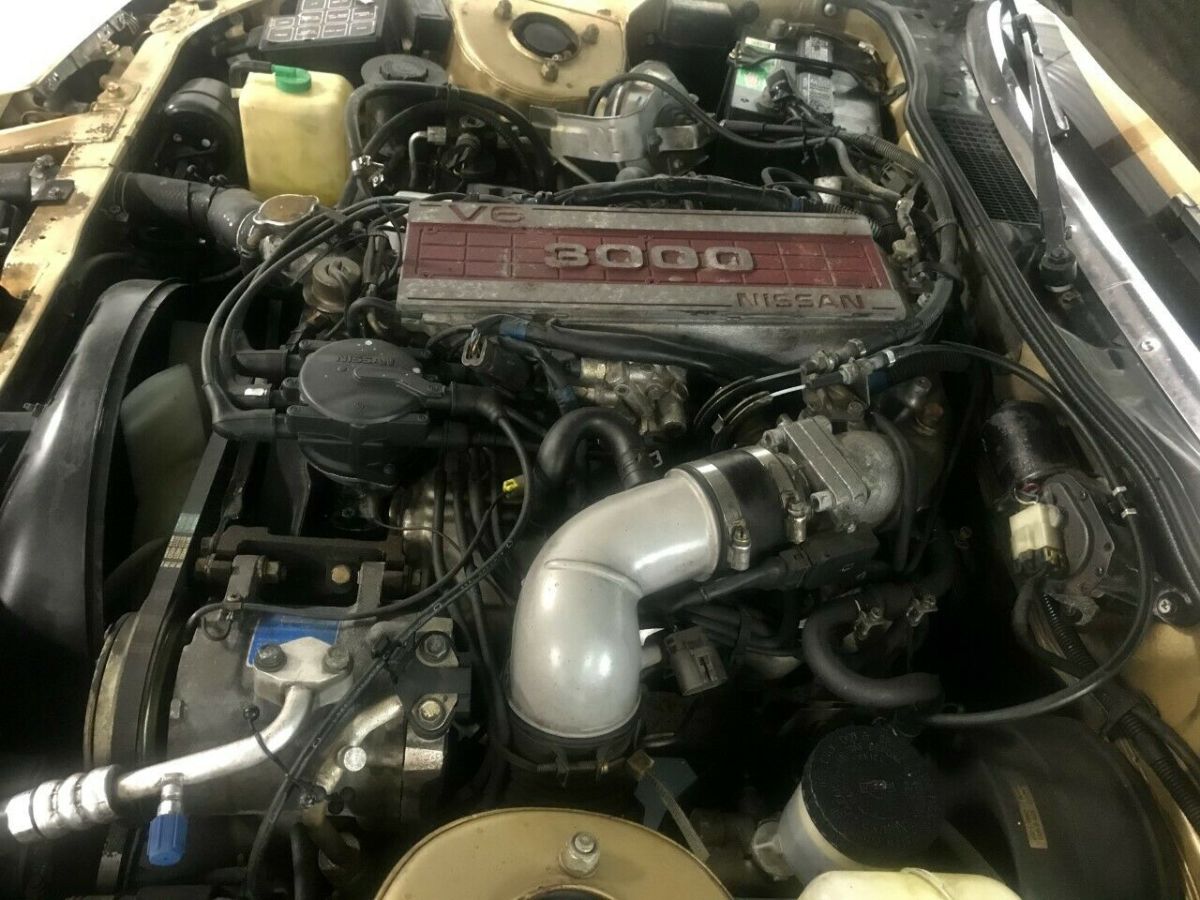 26,541 miles, five speed manual transmission with t-tops