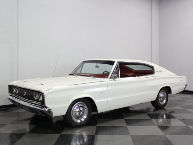 318 v8 with auto trans, 4 buckets with full center console, cool metallic paint!