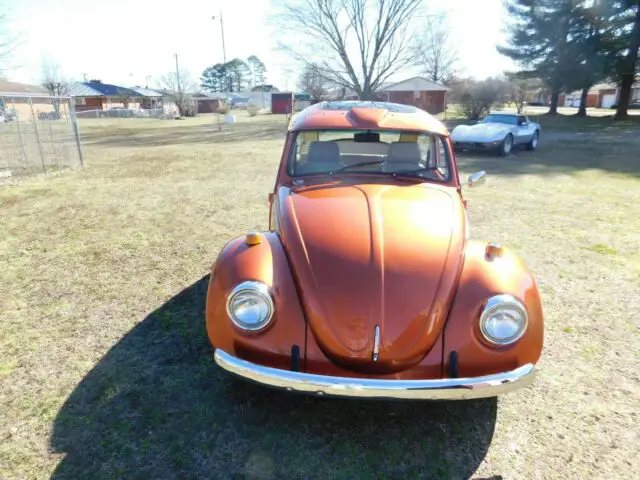 1974 orange volkswagon beetle - classic