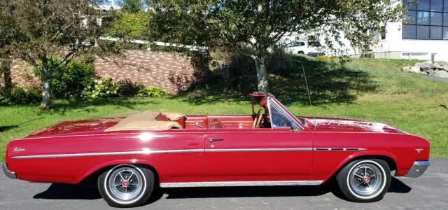 1965 buick skylark convertible,red & tan top,v8, dual exhaust, new seats, maine