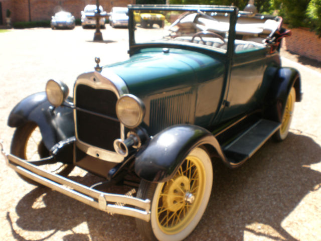 model a sport coupe fitted with a roadster convertible folding top very solid